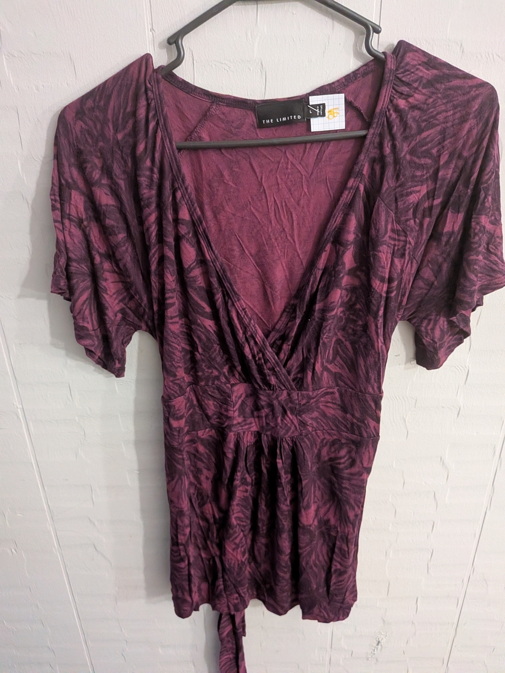 the limited purple short sleeve top